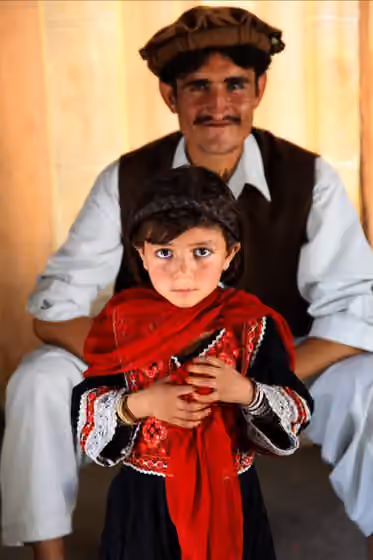 Kharoti — An Afghan family awaits medical care in the Khowst province of Afghanistan on Sep.