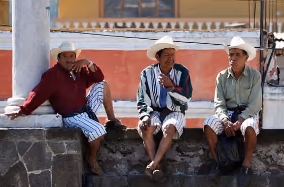 Tzʼutujil people — Tz'utujil men hanging around Santiago de Atitlan, 2009