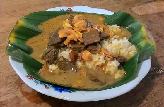 Nasi gandul — Nasi gandul is rice served in sweet and spicy beef soup, specialty of Pati Regency, Central Java, Indonesia.