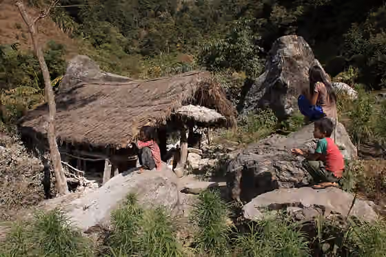 Chepang people — Three little Chepang (A ethnic group in Nepal ) farmer after 2 hours school walking and waiting for their turns at Makwanpur district of Nepal .