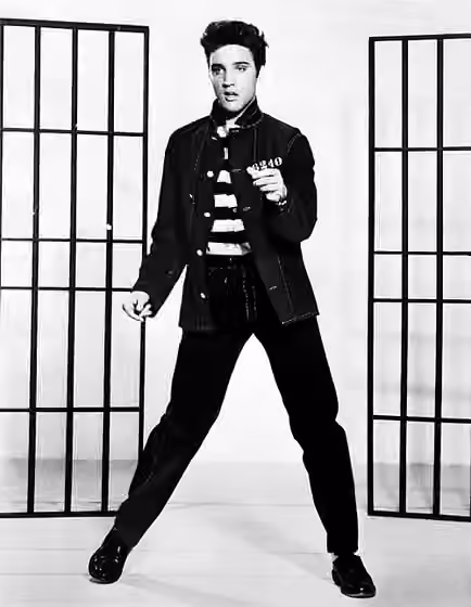 rock and roll — A photograph promoting the film Jailhouse Rock depicts singer Elvis Presley .