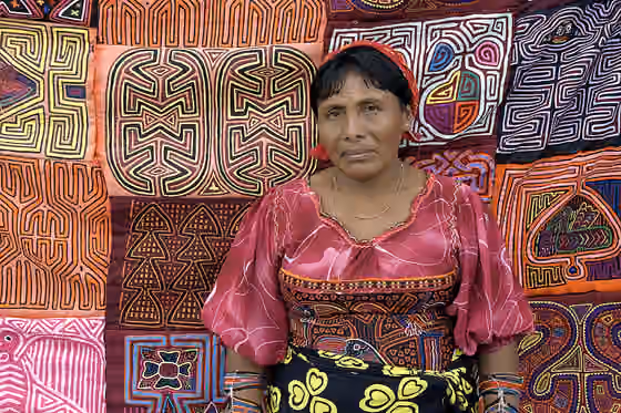 Guna people — Kuna woman selling Molas in Panama City