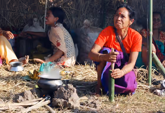 Tiwa people (Americas) — A Tiwa Woman is Preparing her spices in a Bamboo hollow for her delicious and traditional food.