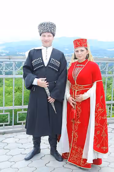 Adighe — Traditional Adyghe costumes for men and women.