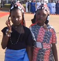 Suku Zarma — Girls wearing traditional Zarma dresses during a gathering.