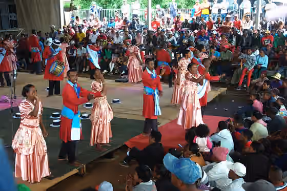 Hiragasy — women and men of a malagasy traditional singer group preforming at Mahamasina stadium.