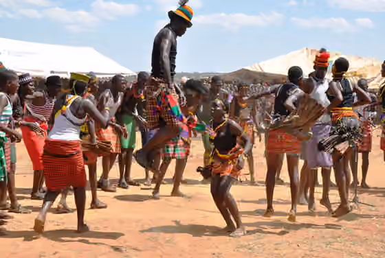 Naleyo — This is a traditional dance that involves jumping and body shaking performed by the Karimojong people in North Eastern Uganda on functions including weddings, calamity cleansing.