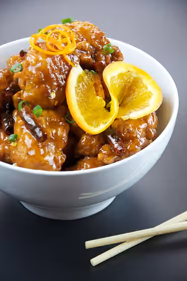 Ayam jeruk — Orange chicken .