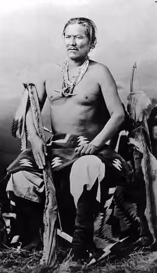 suku Navajo — Studio portrait (sitting) of Manuelito, a Native American (Navajo) man.