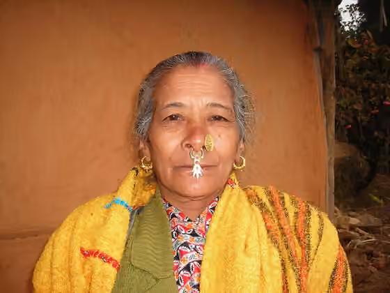 Thami — A woman in eastern Nepal wearing Jhamke Bulaki (Nepali Ornament)