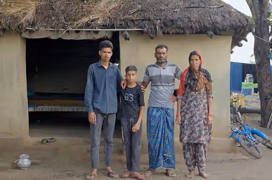 Van Gujjar people — A Van Gujjar family outside their dwelling