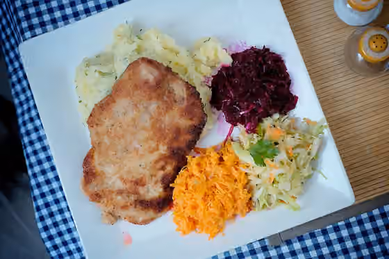 Kotlet schabowy — Kotlet schabowy — fried breaded pork made of tenderloin.