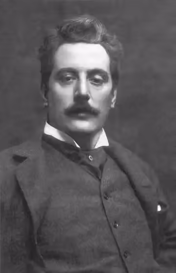 Verismo — Giacomo Puccini in a studio photograph.