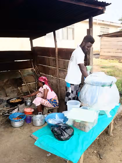 Koko (millet porridge) — Hausa Koko seller serving.