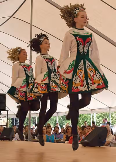 Irish dance — Members of the Davis Academy of Irish Dance leap before the Picatinny crowd