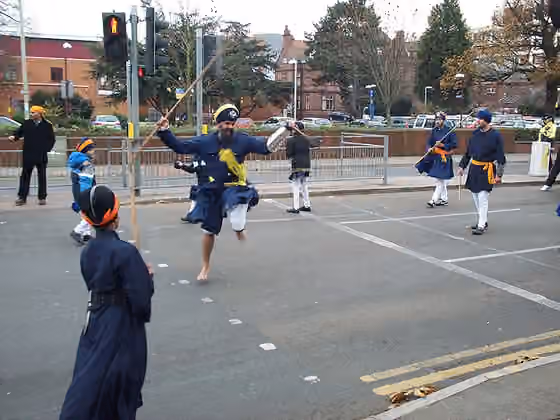 Gatka — Demonstration of the Sikh martial art of Gatka , at the head of a religious procession (celebrating the 538th birthday of Guru Nanak Dev ) by Sikhs in Bedford, Bedfordshire, England.