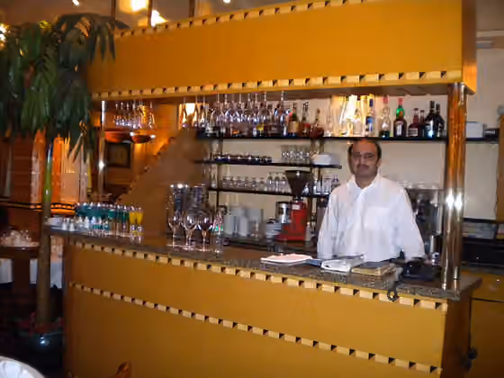 Pakistanis in France — Punjabi hotel manager in a Punjabi restaurant in Paris, France