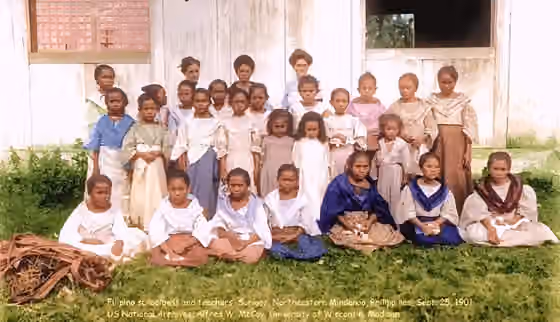 orang Surigaonon — Surigaonon schoolgirls with their teachers, some are American Thomasite teachers 1901
