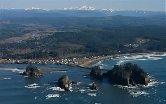 Quileute — Aerial view of La Push, James Island, First Beach, Olympic Mountains.
