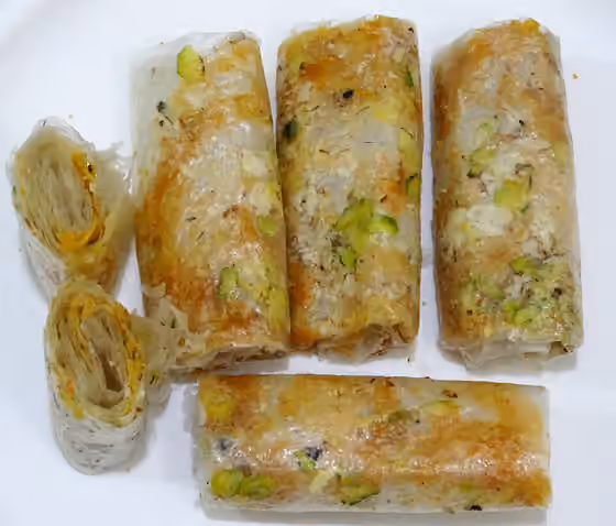 Pootharekulu — Pootharekulu or Poothareku (singular) is a popular sweet from Atreyapuram, East Godavari, India.