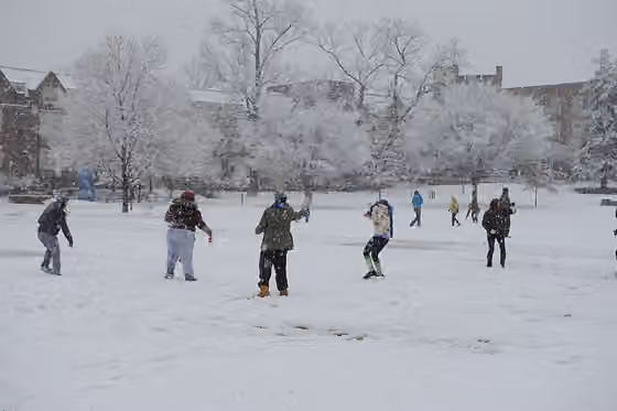 Snow dance — Students compete in a friendly snowball fight on January 13th.