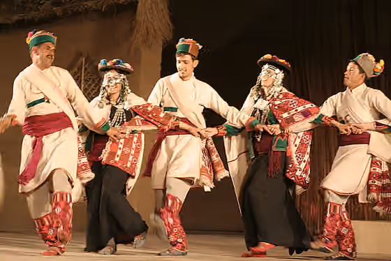Nati (dance) — The beauty of hilly Himachal finds an expression in the languid and elegant movements that form a part of the marvelous Nati dance.