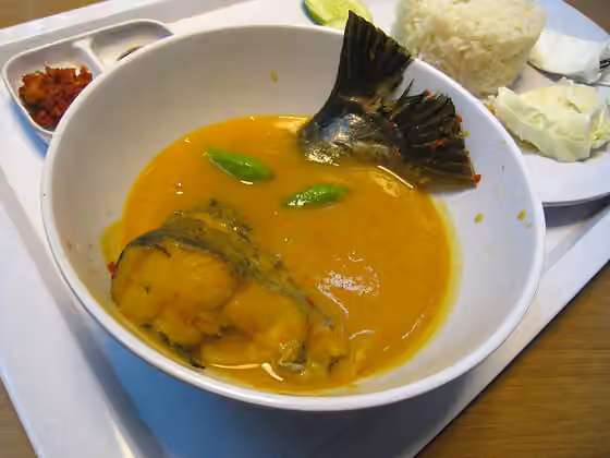 Tempoyak — Tempoyak Ikan Patin, pangasius catfish served in sweet and spicy tempoyak sauce, a fermented durian-based sauce.