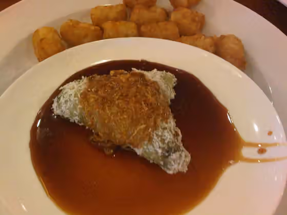 lupis — Sticky rice served with brown sugar.