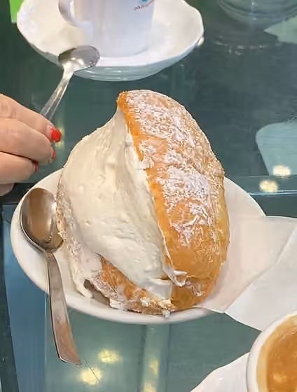 Maritozzo — Freshly baked maritozzo served in a coffee bar in Rome, Quartiere XII Gianicolense