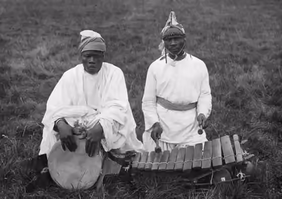 orang Susu — Susu people with djembe and balafo (photograph of unknown origin presented at the International Colonial Exhibition of Paris in 1931)