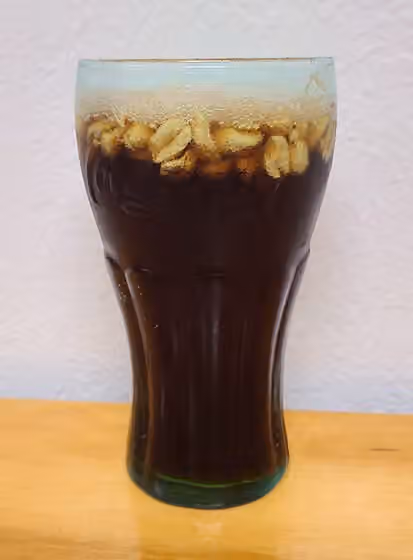 Peanuts and Coke — picture of a glass of Peanuts and Coke