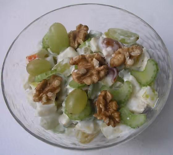 Waldorf salad — Waldorf salad with celery stalks, green grapes, walnuts, apples, mayonnaise, crème fraîche, sugar and salt