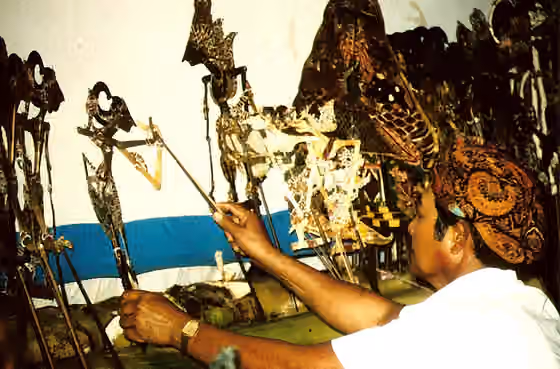 Diaspora Jawa — The dalang , a Surinamese-Javanese puppetplayer, plays scenes from the Ramayana, during a wedding ceremony, in the outskirts of Paramaribo, the capital of Suriname