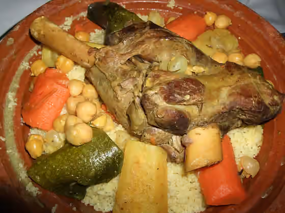 Hidangan Berber — (traditionally steamed couscous, topped with lamb & stewed vegetables)