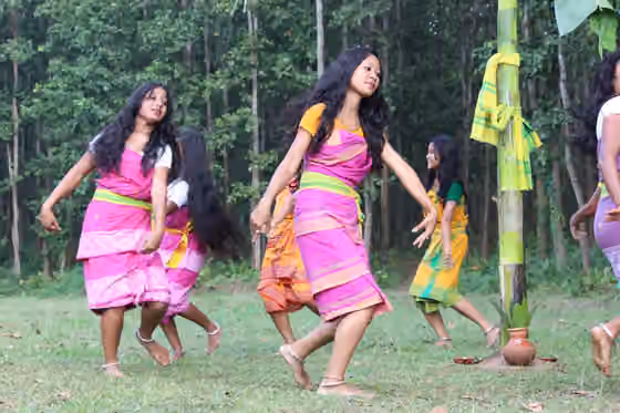 Rajbanshi people — Koch Rajbongshi Tribe performing their traditional folk dance at Assam, India.