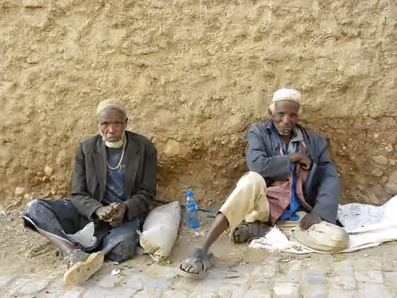 orang Harari — Two Harari men consuming khat in the street of Harar, Ethiopia
