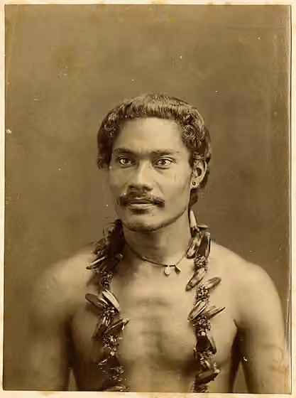 orang Polinesia — Object type: photographic print (black and white), cabinet card term details Museum number: Oc,B43.8 Description: Photograph (black and white); cabinet card; portrait of a man with a moustache, an earring, a necklace with two small…