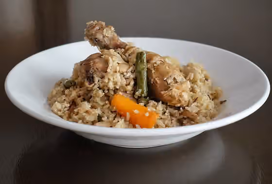 Anglo-Indian cuisine — A one pot dish of chicken , rice and vegetables .